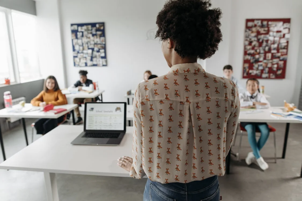 teacher addressing students in class while maintaining boundaries with students and parents