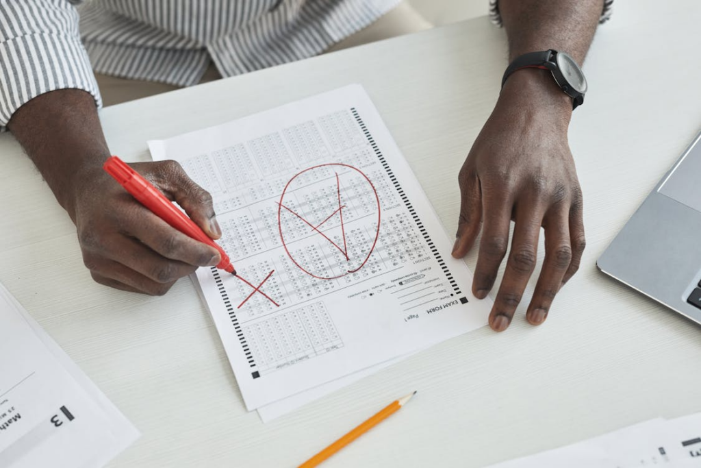 graded exam paper showing professor grading expectations through marked scoring