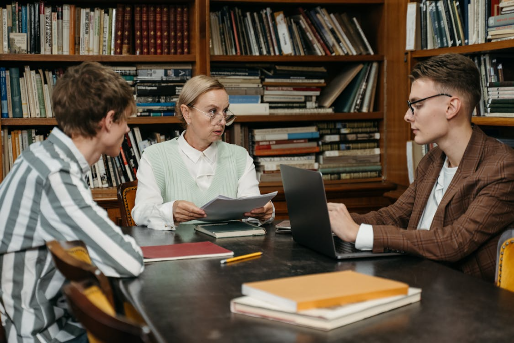student discussing wrong major signs with an academic adviser during a planning meeting